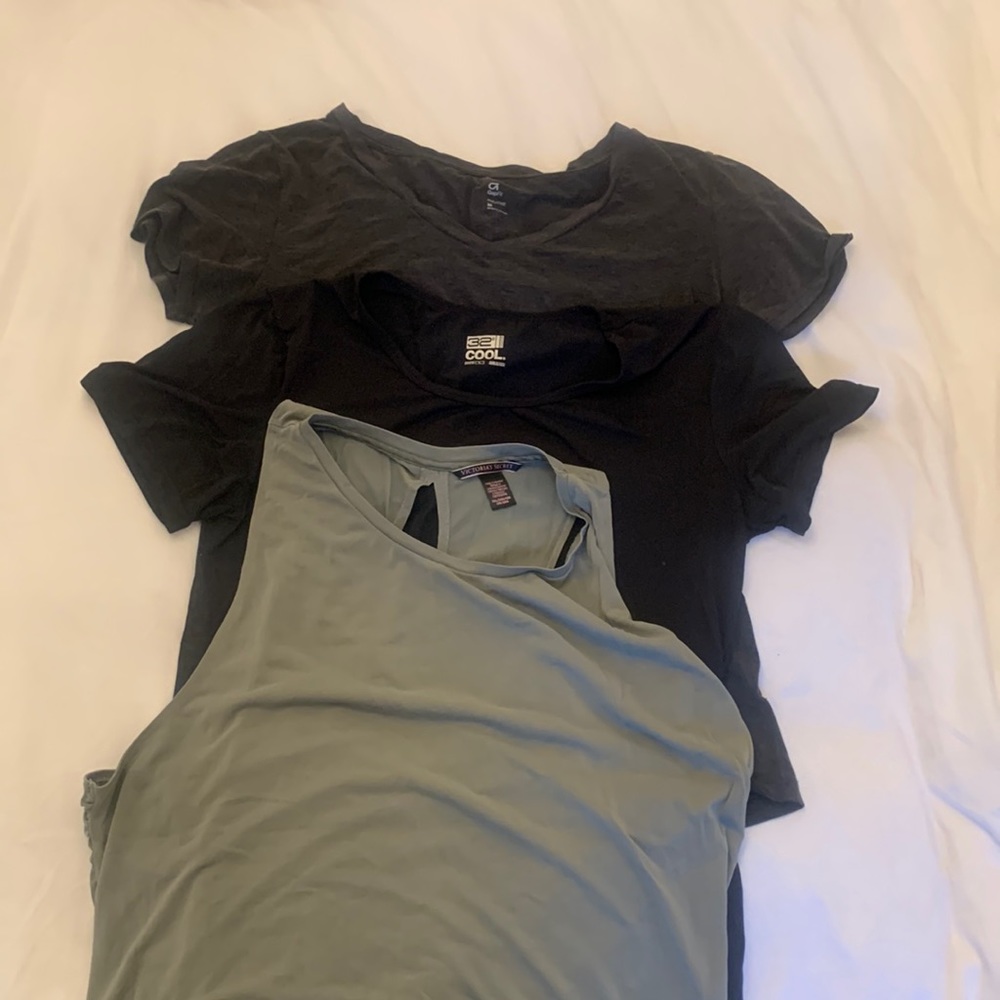 Bundle of workout shirts. 2 short sleeved and 1 sleeveless. Sized M, L and XXL.